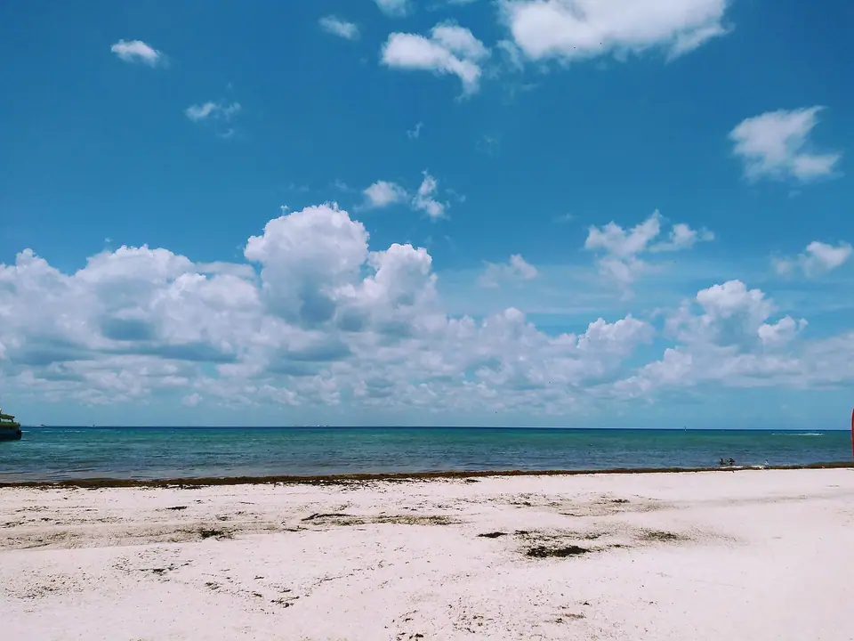 Turquoise Caribbean water and white sand at Playacar beach in Playa del Carmen